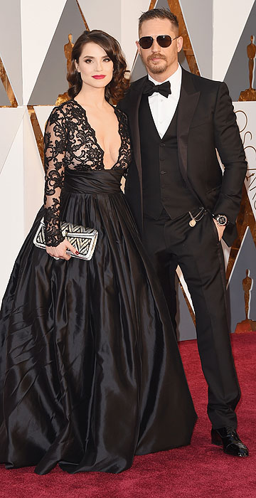 HOLLYWOOD, CA - FEBRUARY 28: Actors Tom Hardy (R) and Charlotte Riley attend the 88th Annual Academy Awards at Hollywood & Highland Center on February 28, 2016 in Hollywood, California. (Photo by Jason Merritt/Getty Images)